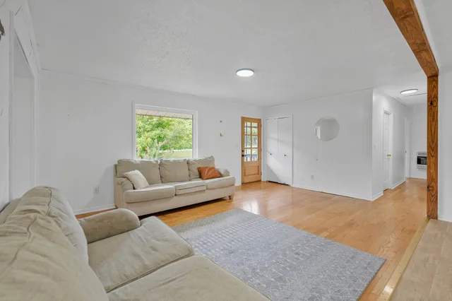 a living room with furniture and window