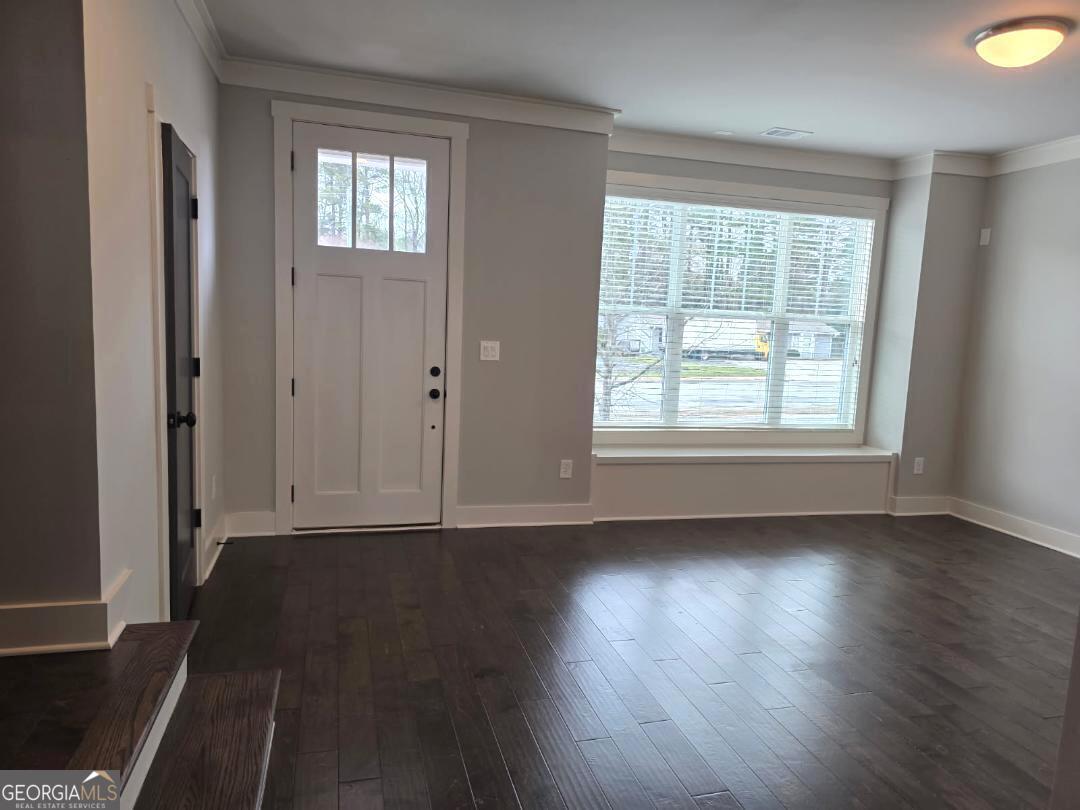 3176 Kincaid Drive Decatur, GA 30033 - Photo 13 of 89 an empty room with wooden floor and windows