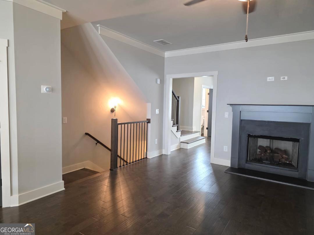 3176 Kincaid Drive Decatur, GA 30033 - Photo 20 of 89 an empty room with wooden floor fireplace and windows