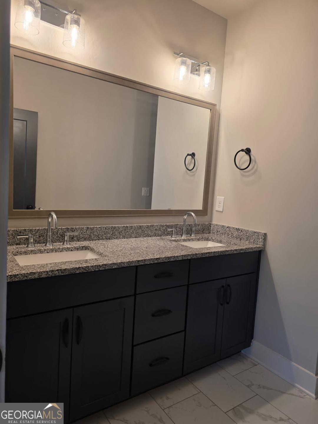 3176 Kincaid Drive Decatur, GA 30033 - Photo 29 of 89 a bathroom with a granite countertop sink and a mirror