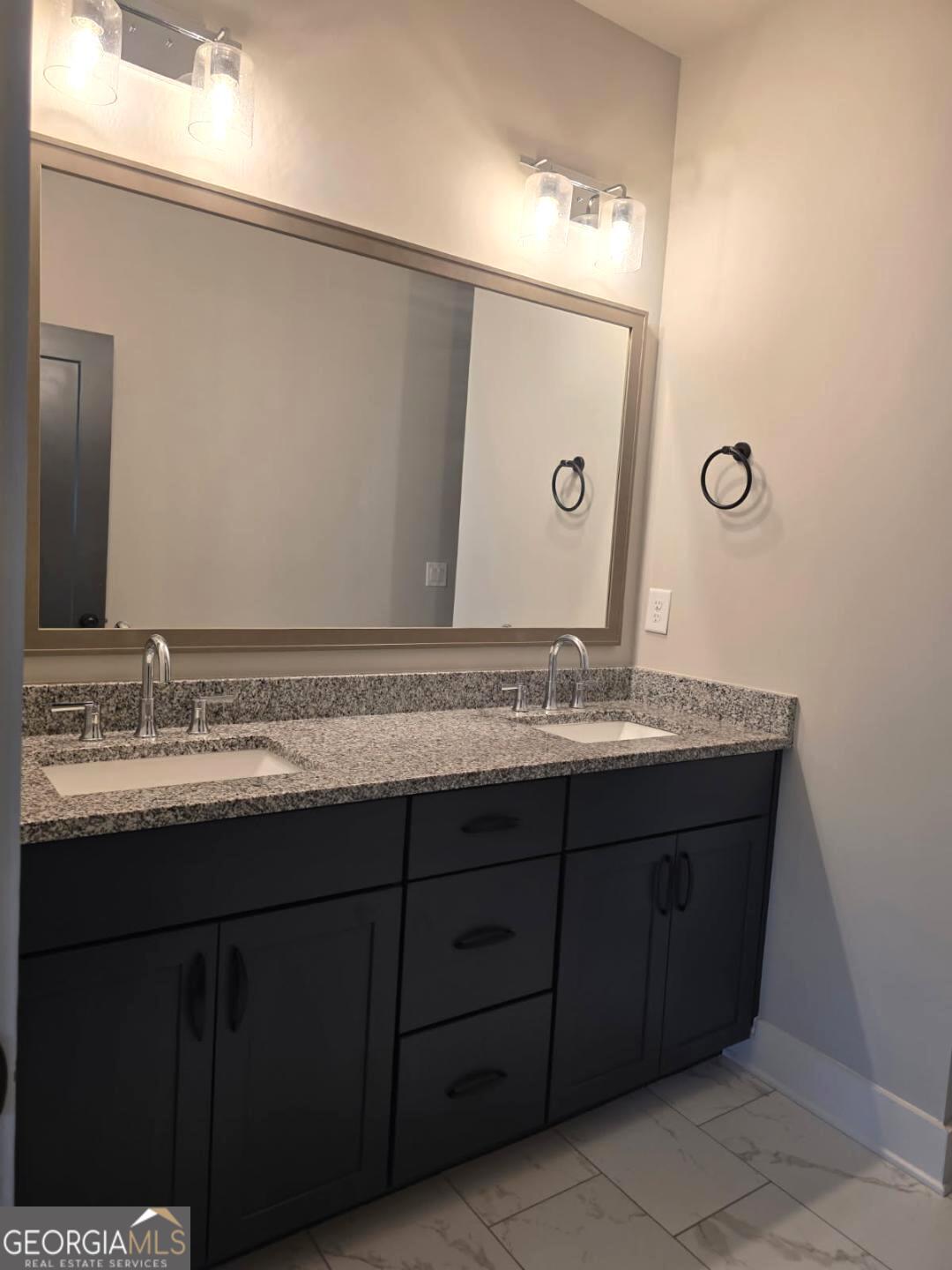 3176 Kincaid Drive Decatur, GA 30033 - Photo 30 of 89 a bathroom with a granite countertop sink and a mirror