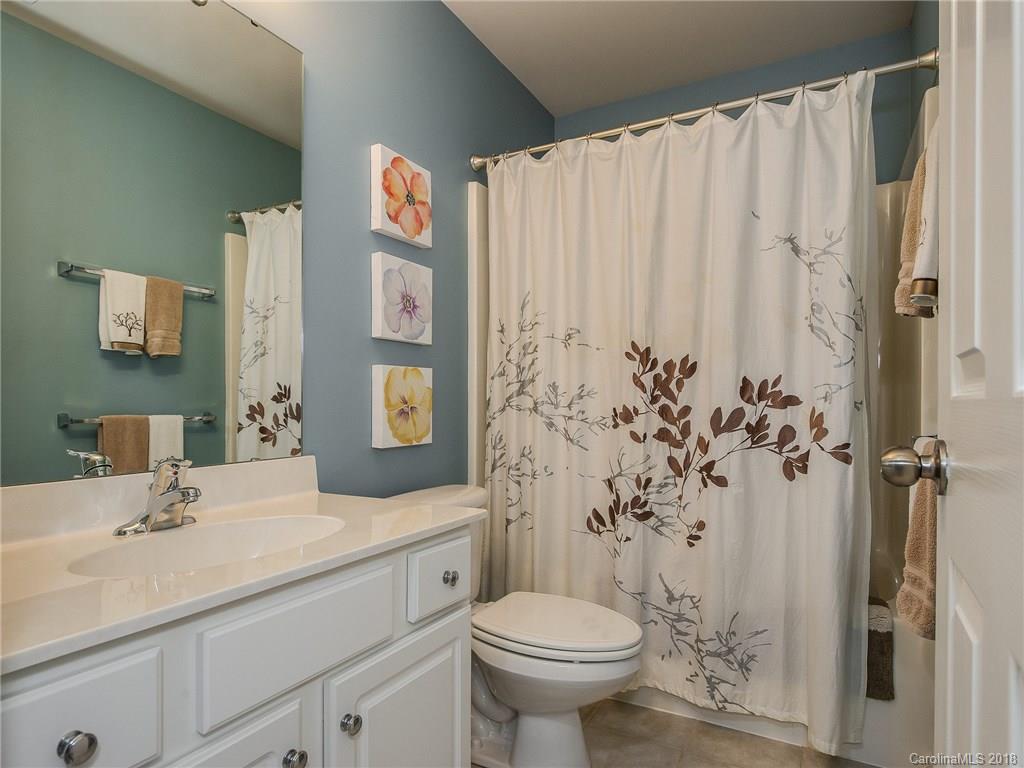 9176 Redmond Trace Road Charlotte, NC 28277 - Photo 18 of 24 a bathroom with a sink toilet and shower