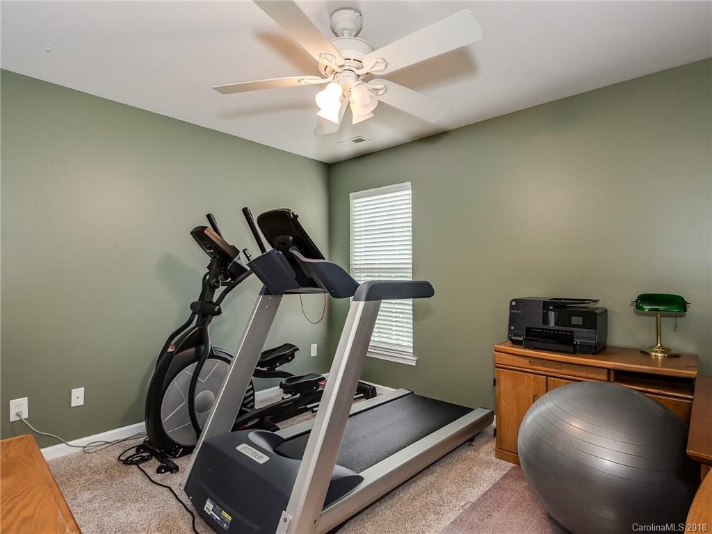 9176 Redmond Trace Road Charlotte, NC 28277 - Photo 19 of 24 a room with gym equipment