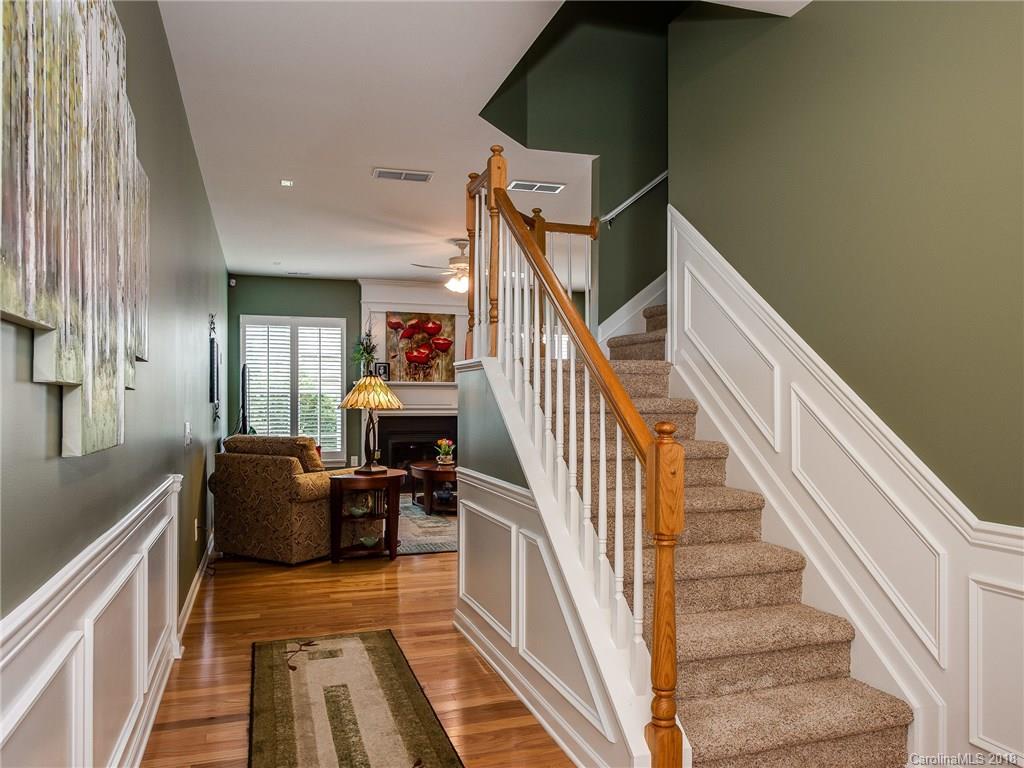 9176 Redmond Trace Road Charlotte, NC 28277 - Photo 4 of 24 a view of entryway and hall with wooden floor