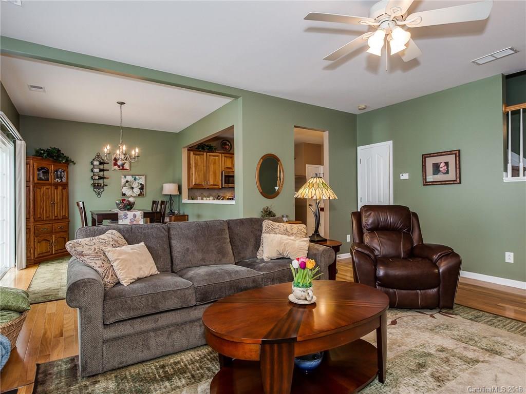 9176 Redmond Trace Road Charlotte, NC 28277 - Photo 7 of 24 a living room with furniture and a large window