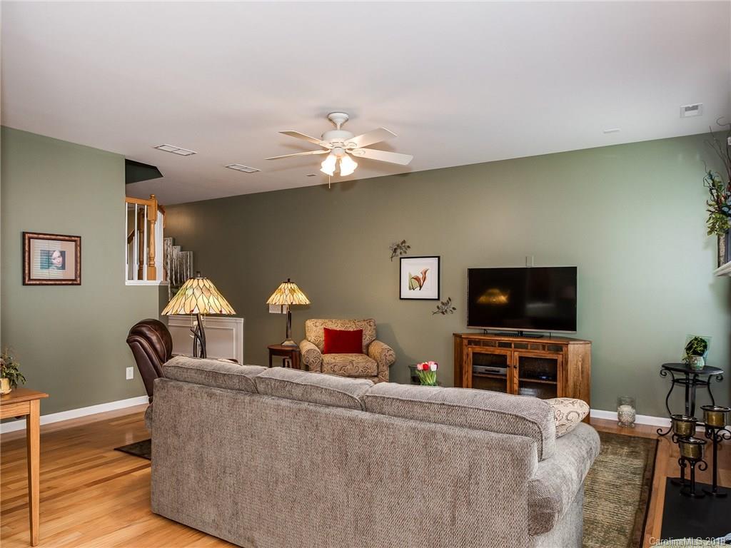 9176 Redmond Trace Road Charlotte, NC 28277 - Photo 8 of 24 a living room with furniture and a flat screen tv