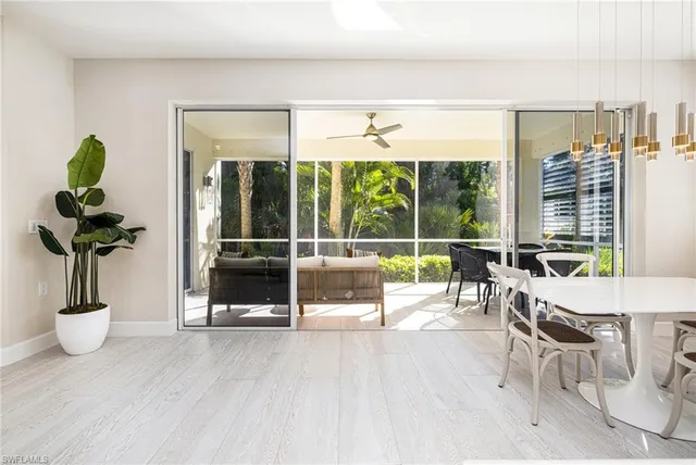 a view of a living room and hardwood floor