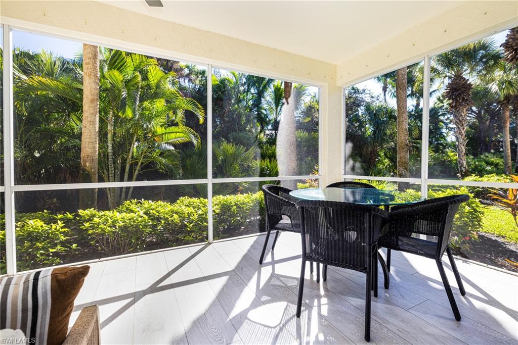 19071 Ridgepoint Drive, Unit 102 Estero, FL 33928 - Photo 33 of 50 a view of a two chairs in the patio