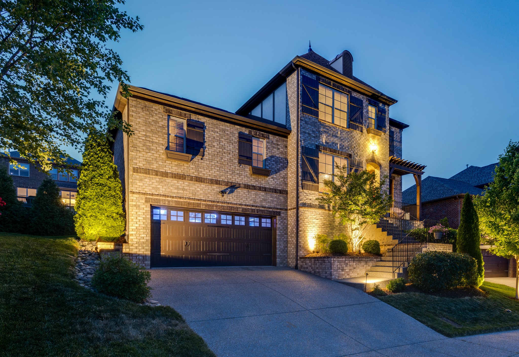 5108 Mountainbrook Circle Hermitage, TN 37076 - Photo 1 of 43 a front view of a house with a yard and garage