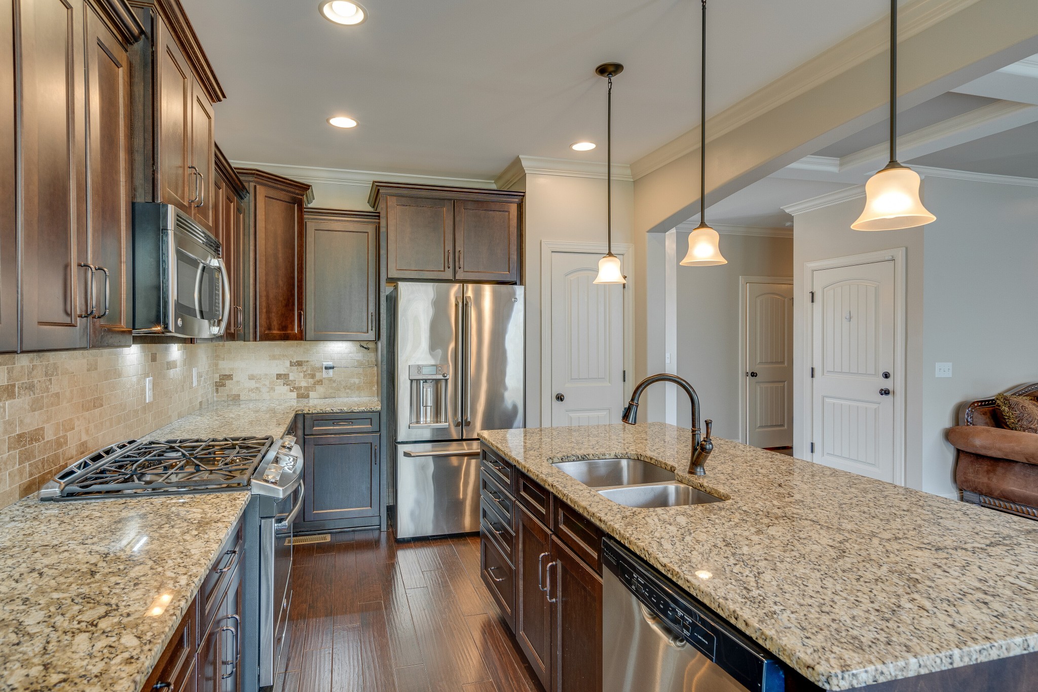 5108 Mountainbrook Circle Hermitage, TN 37076 - Photo 12 of 43 a kitchen with granite countertop a sink a counter space appliances and cabinets