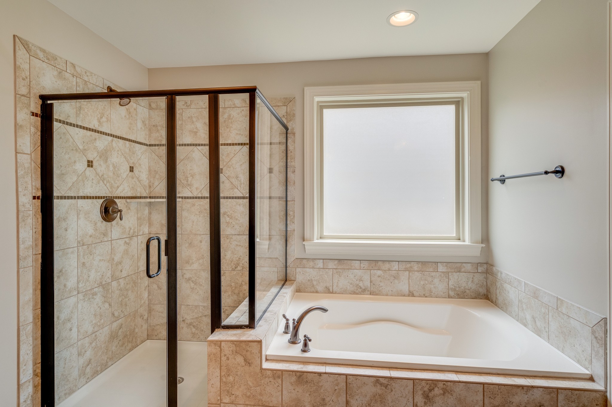 5108 Mountainbrook Circle Hermitage, TN 37076 - Photo 17 of 43 a white bath tub sitting next to a shower