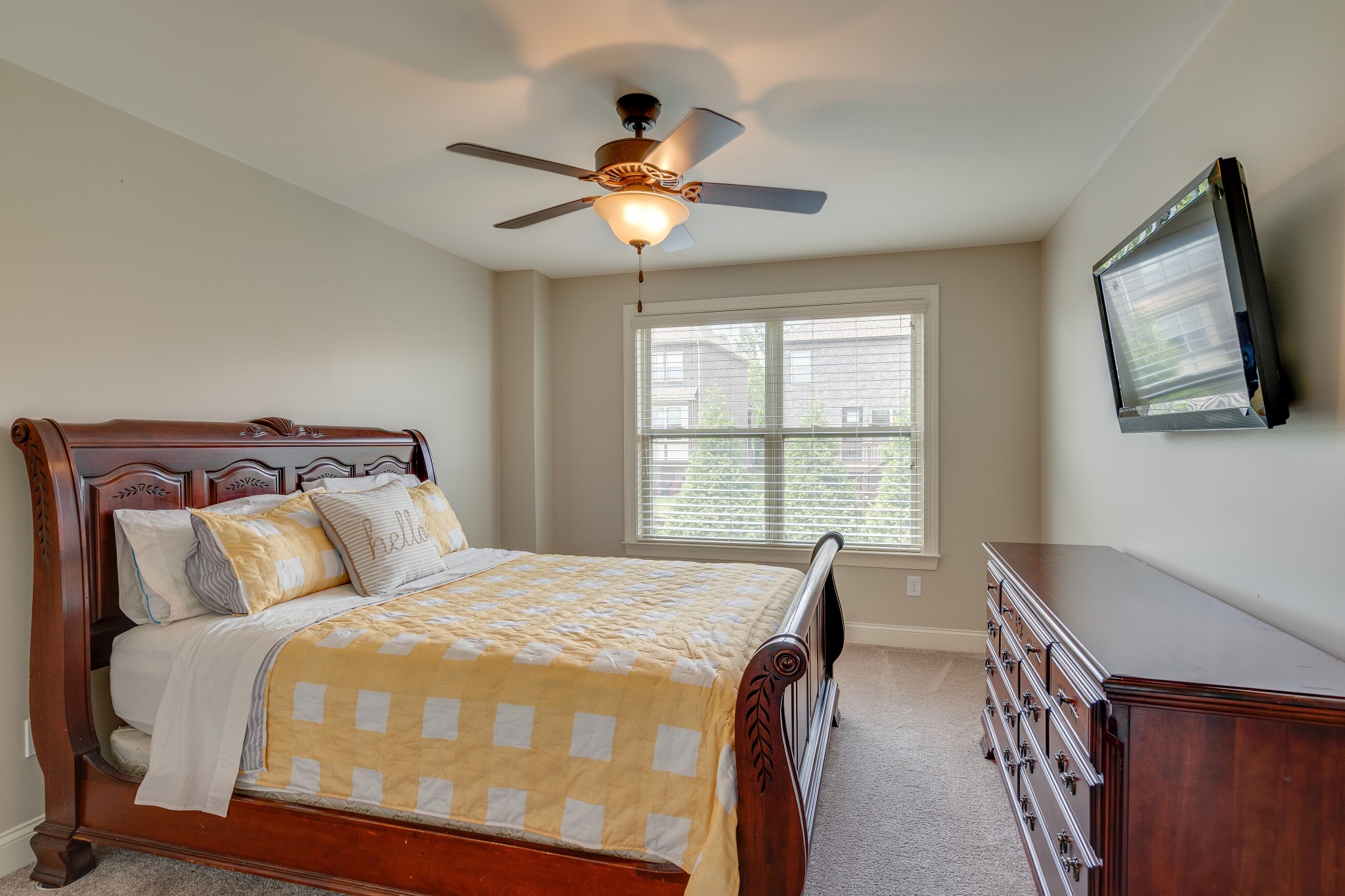 5108 Mountainbrook Circle Hermitage, TN 37076 - Photo 22 of 43 a bedroom with a bed and a chandelier
