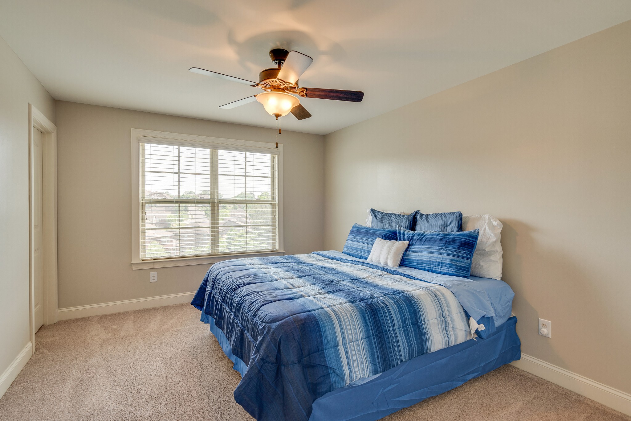 5108 Mountainbrook Circle Hermitage, TN 37076 - Photo 23 of 43 a bed sitting in a bedroom next to a window