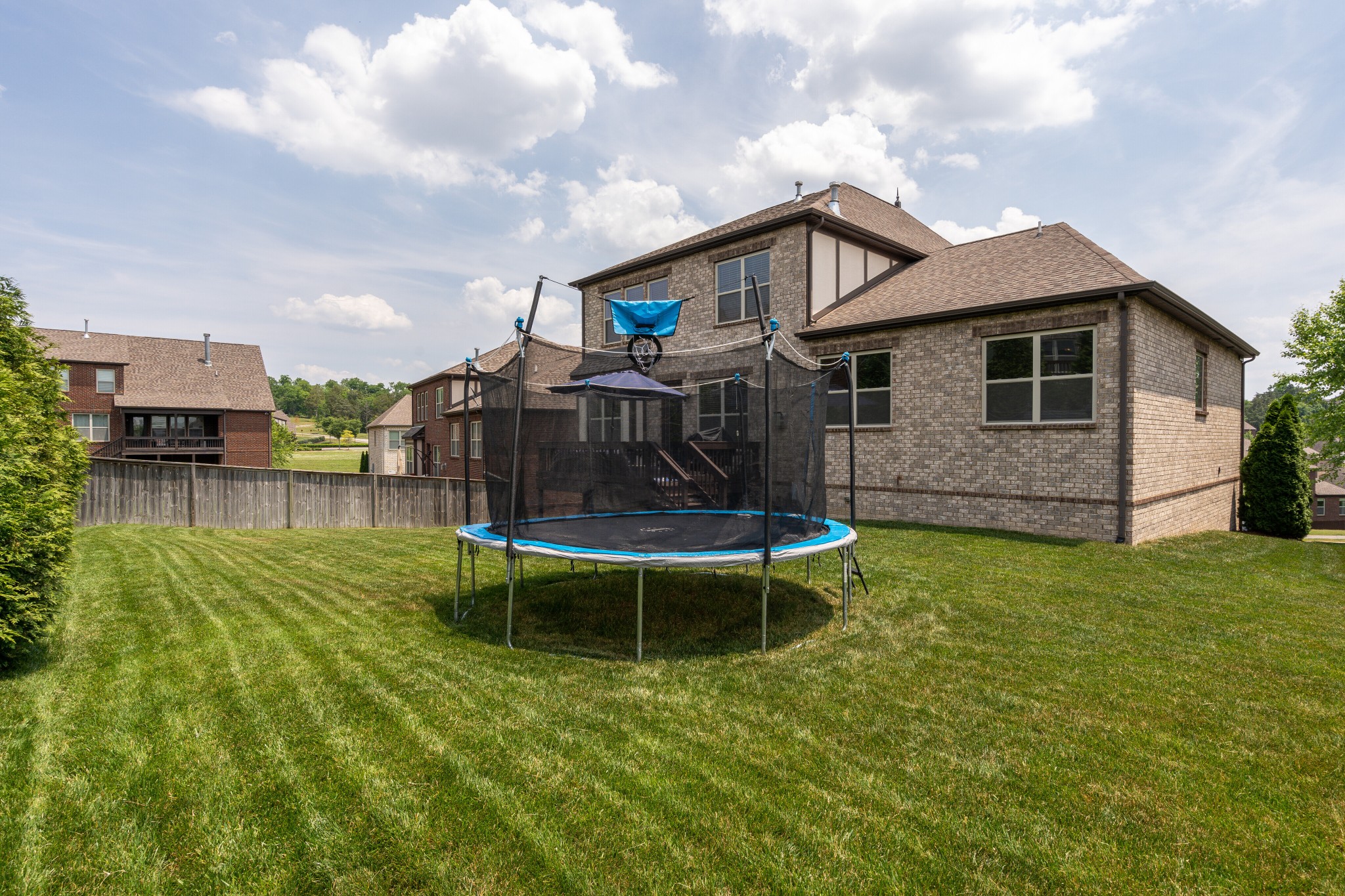5108 Mountainbrook Circle Hermitage, TN 37076 - Photo 32 of 43 a view of a house with a backyard