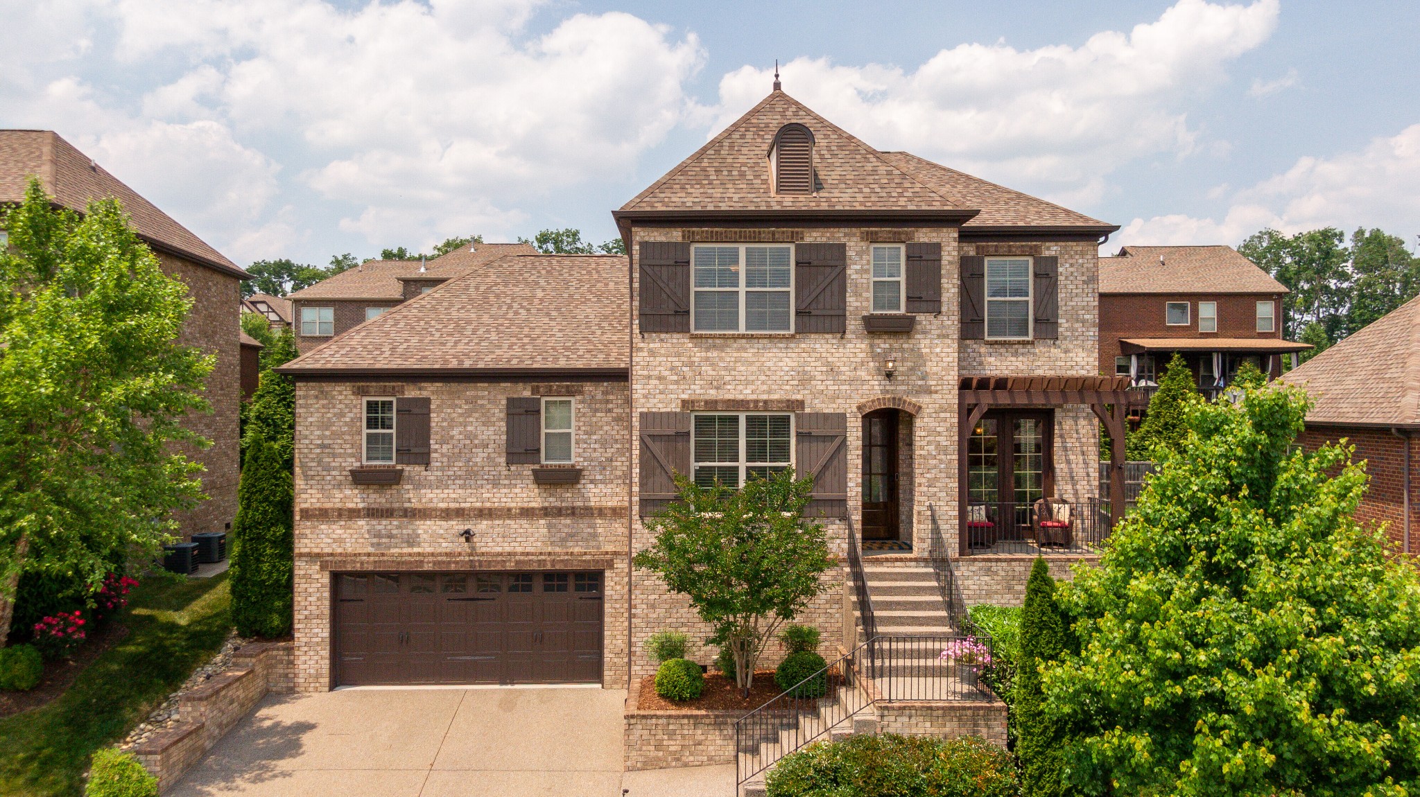 5108 Mountainbrook Circle Hermitage, TN 37076 - Photo 36 of 43 a front view of a house with a garden