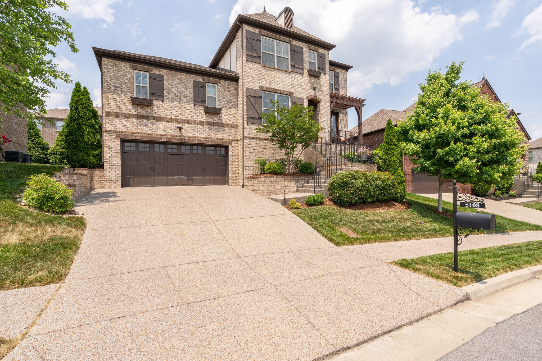 5108 Mountainbrook Circle Hermitage, TN 37076 - Photo 38 of 43 a front view of a house with yard