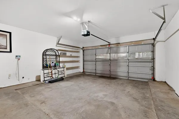 a view of a garage with storage