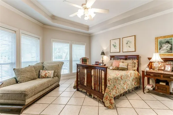 a bed room with a bed and a couch