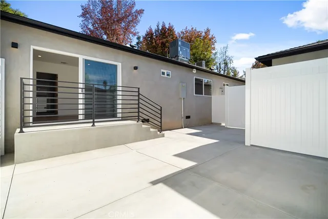 a view of a garden with a bench