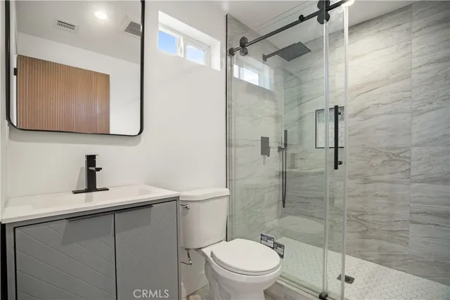 a picture of a bench in a bathroom