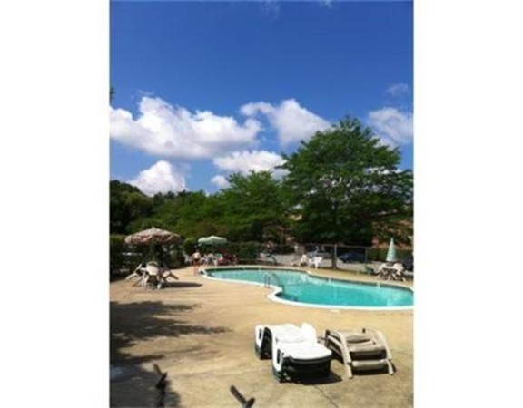 76 Bryon Road, Unit 5 Chestnut Hill, MA 02467 - Photo 7 of 10 a park view with table and chairs