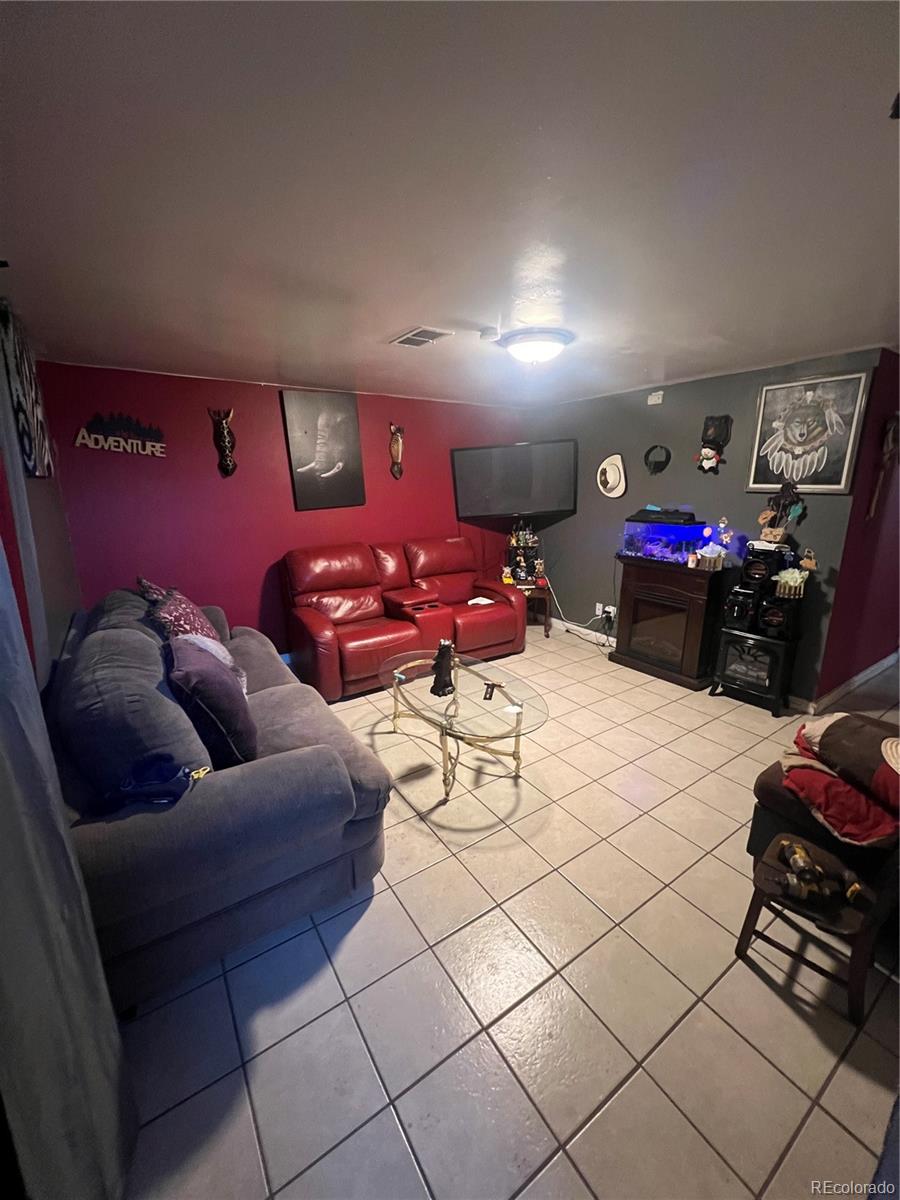 274 South Meade Street Denver, CO 80219 - Photo 4 of 14 a living room with furniture