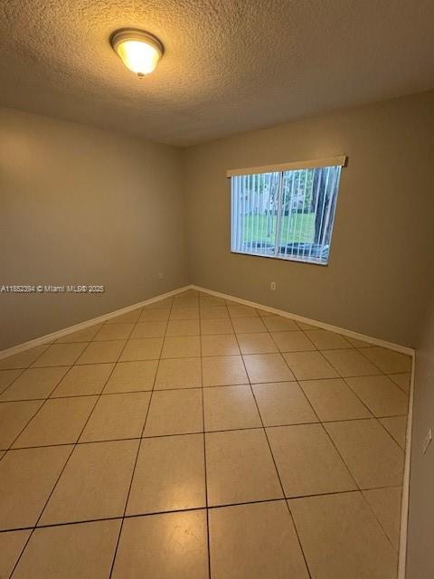 2701 Southeast 12th Road, Unit 106 Homestead, FL 33035 - Photo 16 of 21 a view of an empty room and window