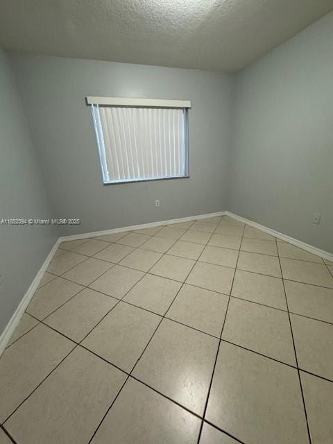 2701 Southeast 12th Road, Unit 106 Homestead, FL 33035 - Photo 17 of 21 a view of an empty room and a window