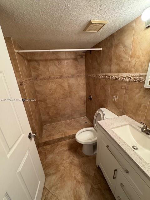 2701 Southeast 12th Road, Unit 106 Homestead, FL 33035 - Photo 21 of 21 a bathroom with a sink a toilet and shower