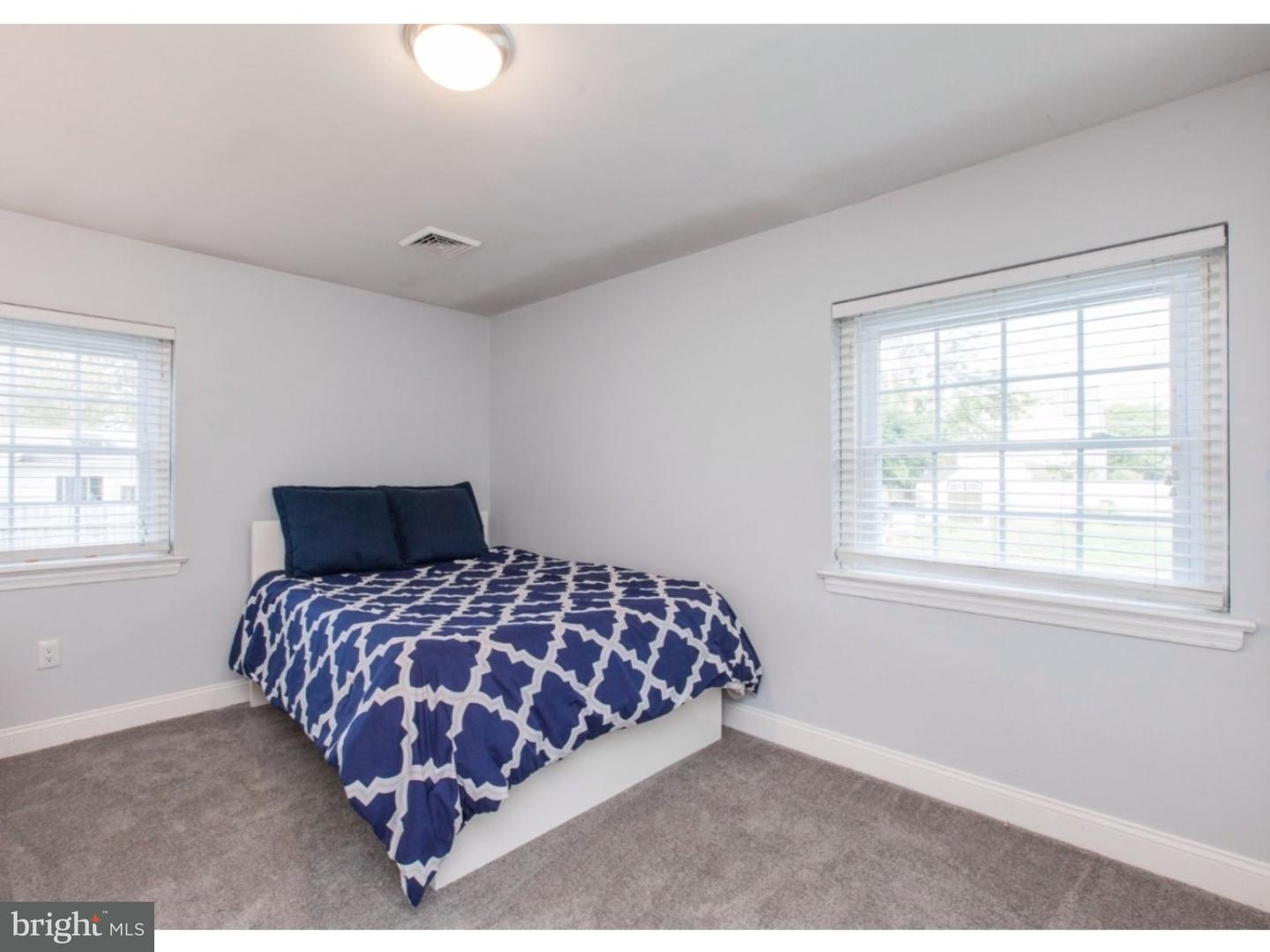 1238 Dill Road Havertown, PA 19083 - Photo 17 of 23 a bedroom with a bed and a window
