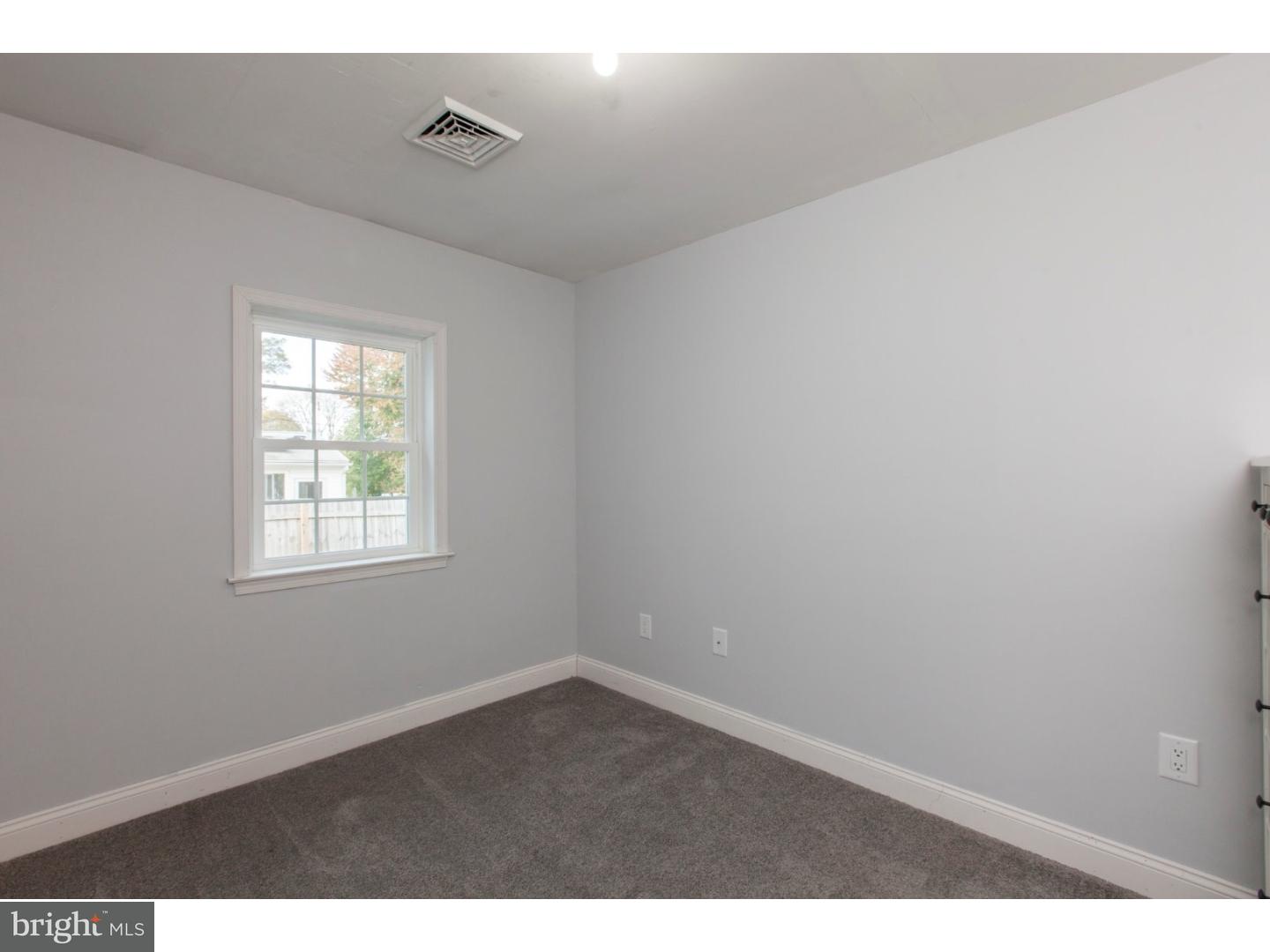 1238 Dill Road Havertown, PA 19083 - Photo 19 of 23 an empty room with a window