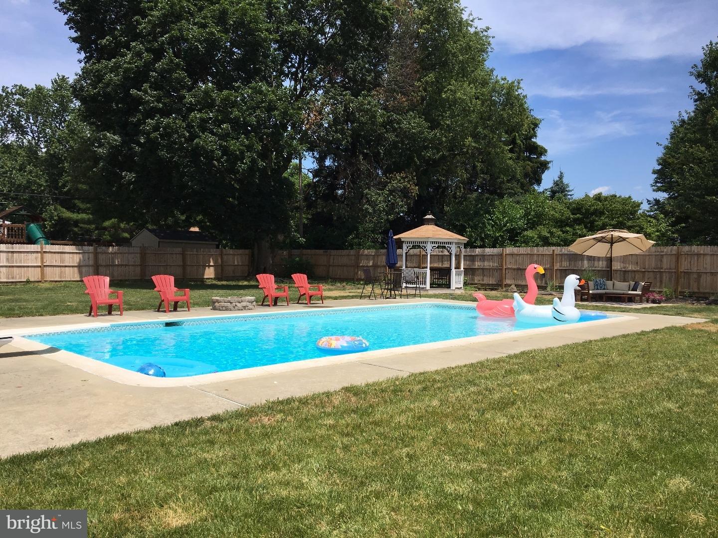 1238 Dill Road Havertown, PA 19083 - Photo 22 of 23 a view of a house with a swimming pool