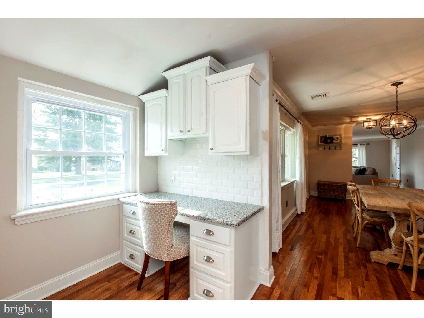 1238 Dill Road Havertown, PA 19083 - Photo 7 of 23 a view of kitchen and dining room with wooden floor
