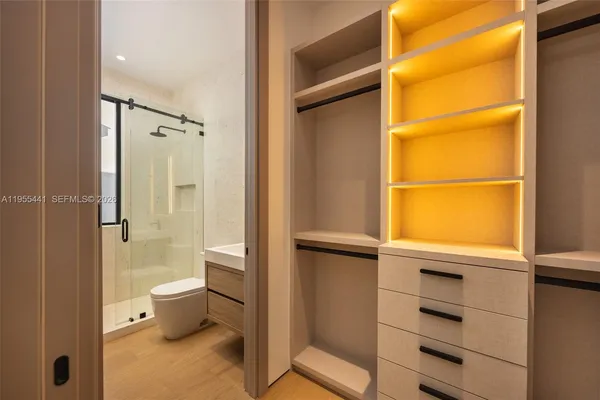 a bathroom with a tub and shower