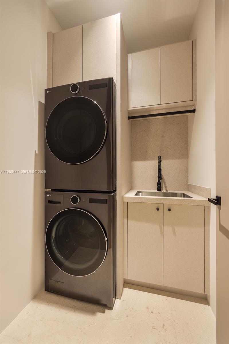 3144 Elizabeth Street Coconut Grove, FL 33133 - Photo 36 of 39 a utility room with sink dryer and washer