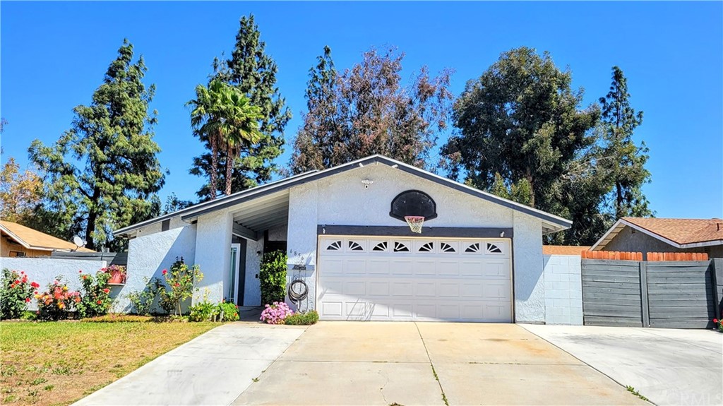 6856 Butte Drive Riverside, CA 92505 - Photo 1 of 1 a view of a entrance gate of the house and trees
