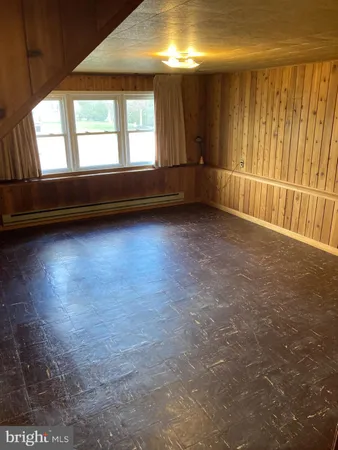 en empty room with windows