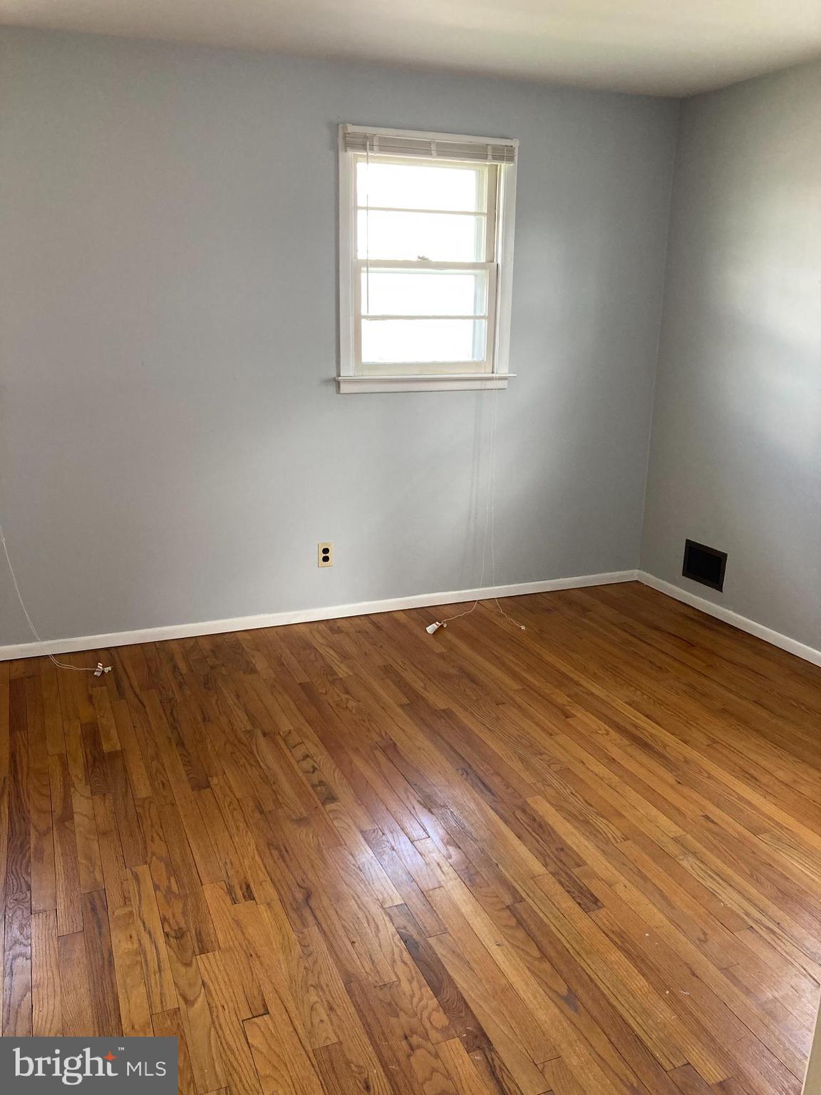 25 Mallory Way Hamilton, NJ 08610 - Photo 12 of 20 a view of empty room with wooden floor