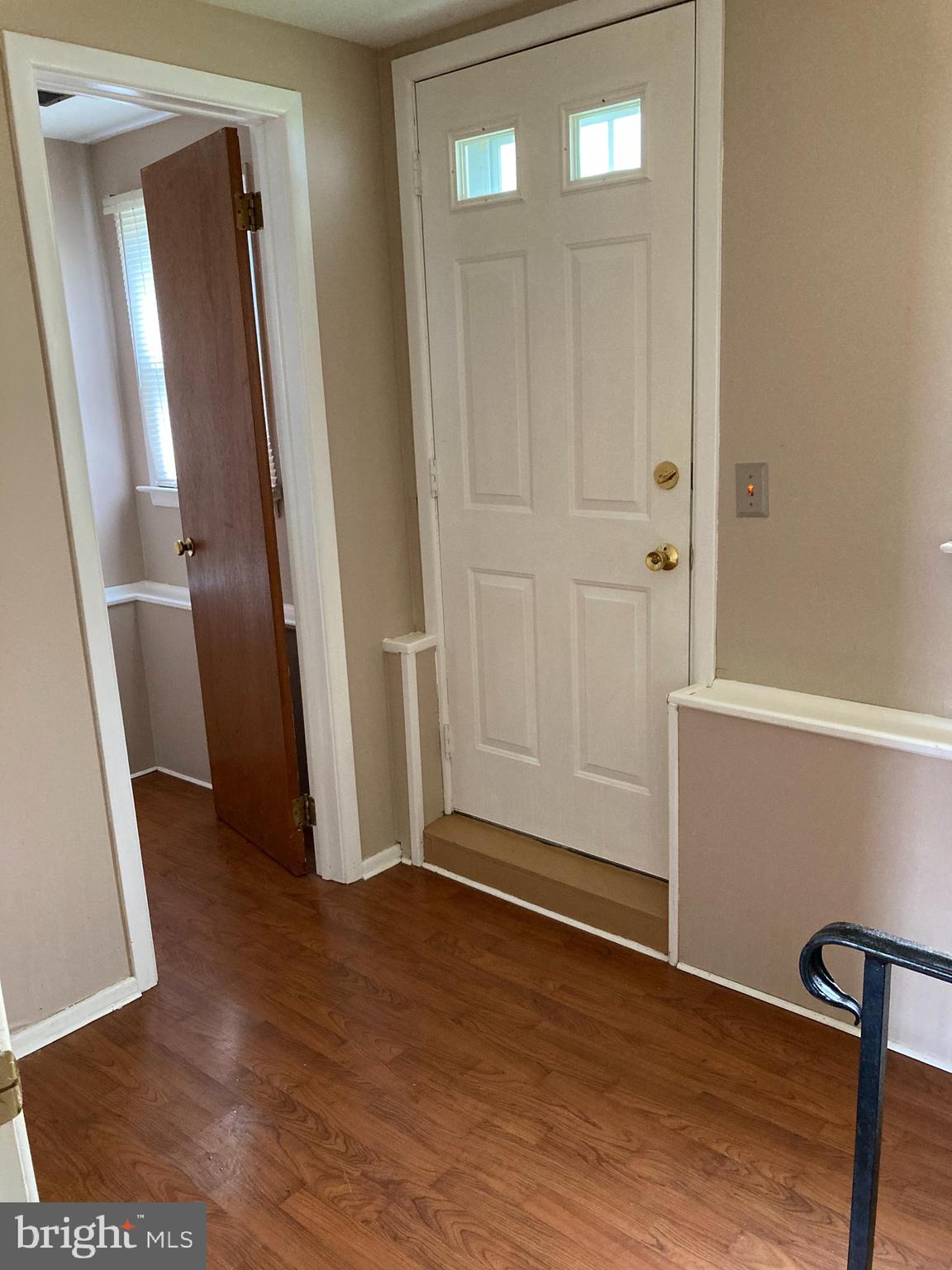 25 Mallory Way Hamilton, NJ 08610 - Photo 18 of 20 an empty room with wooden floor and entrance