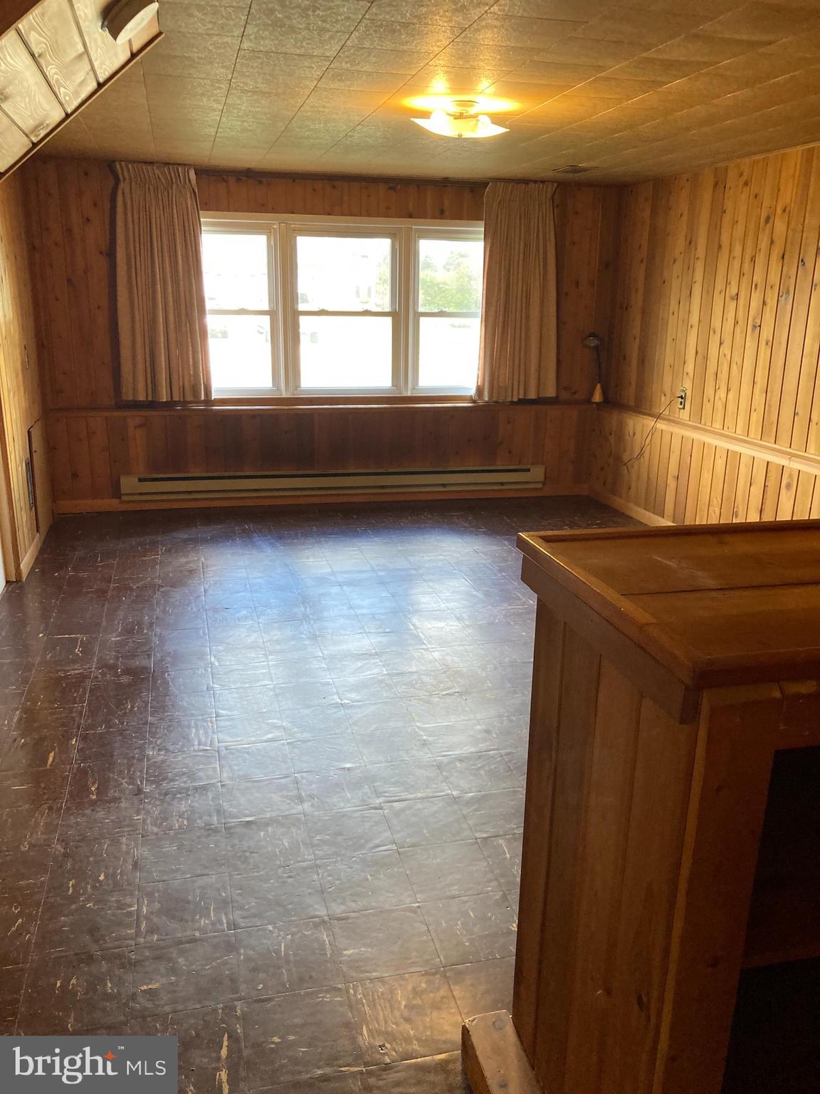 25 Mallory Way Hamilton, NJ 08610 - Photo 10 of 20 an empty room with wooden floor and windows