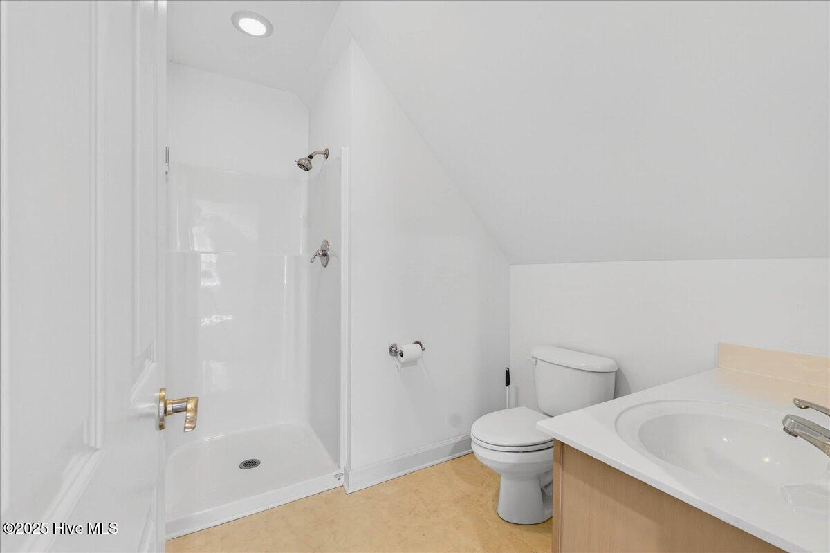 8985 Woodbine Road Southwest Sunset Beach, NC 28468 - Photo 47 of 65 Upstairs bathroom