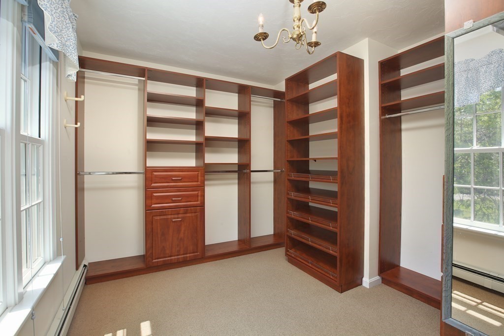 5 Charles Everett Way Hingham, MA 02043 - Photo 16 of 27 a view of walk in closet with empty racks