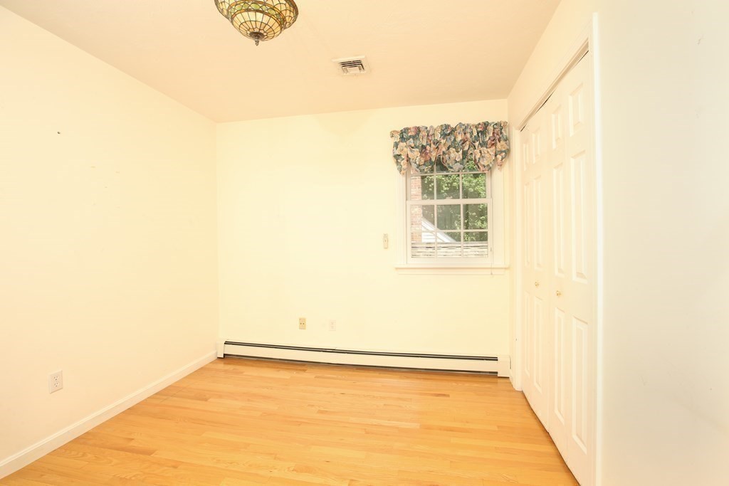 5 Charles Everett Way Hingham, MA 02043 - Photo 19 of 27 a view of a big room with wooden floor