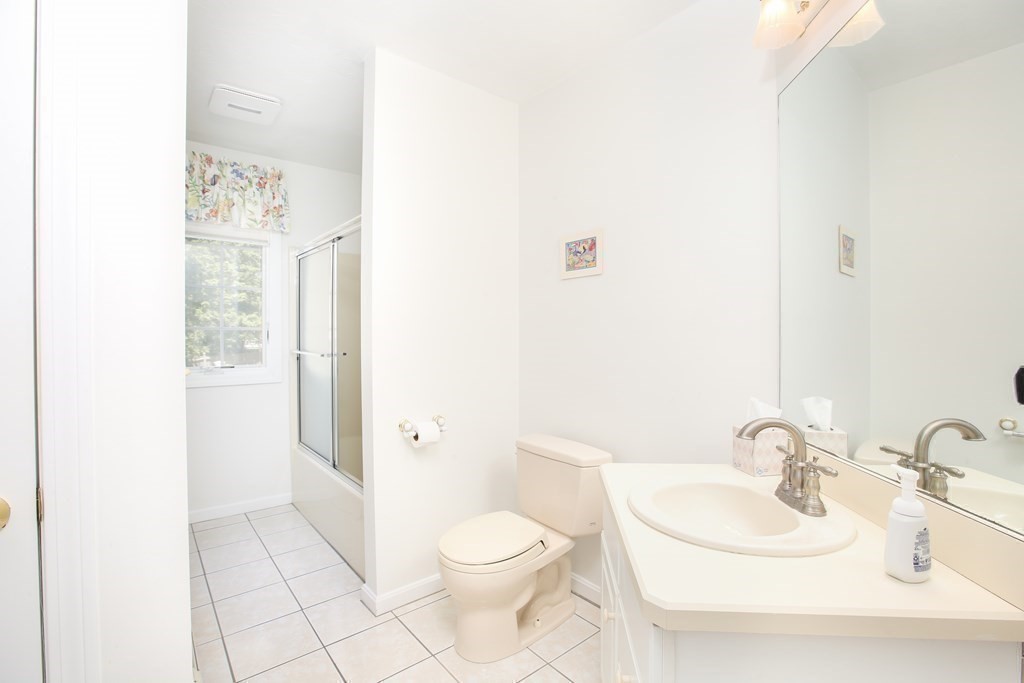 5 Charles Everett Way Hingham, MA 02043 - Photo 20 of 27 a bathroom with a sink a toilet and shower