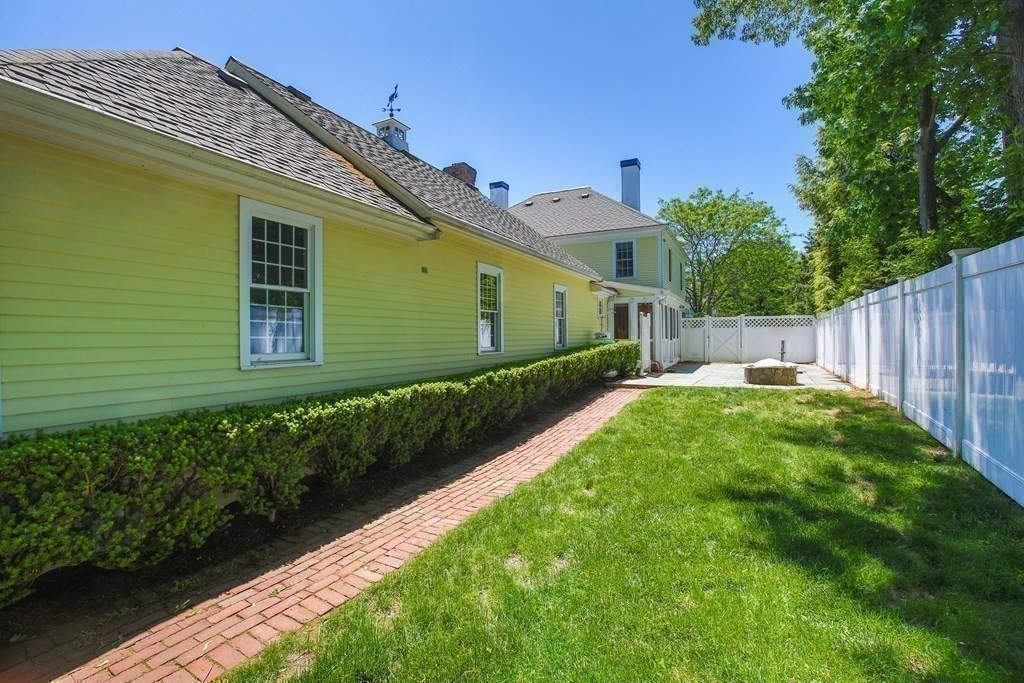 5 Charles Everett Way Hingham, MA 02043 - Photo 26 of 27 a front view of a house with garden