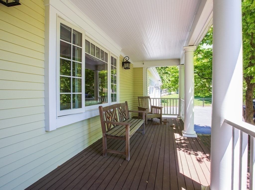 5 Charles Everett Way Hingham, MA 02043 - Photo 5 of 27 a view of two chairs in the balcony