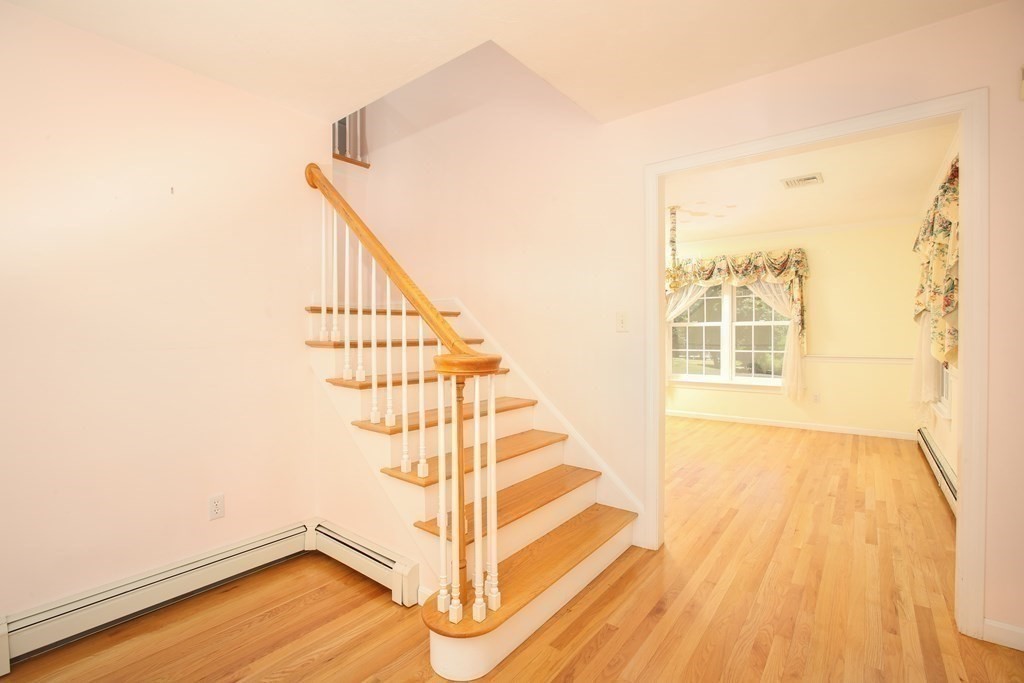 5 Charles Everett Way Hingham, MA 02043 - Photo 7 of 27 a view of entryway with wooden floor