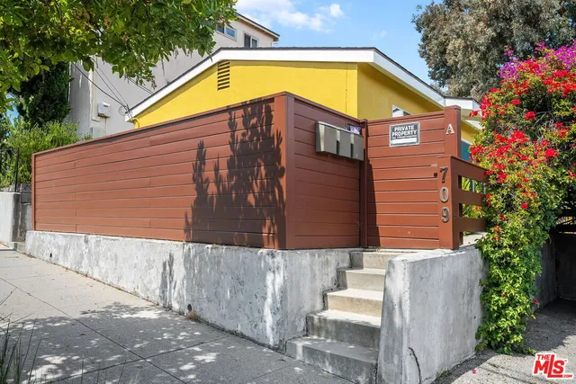 a view of a house with a swimming pool