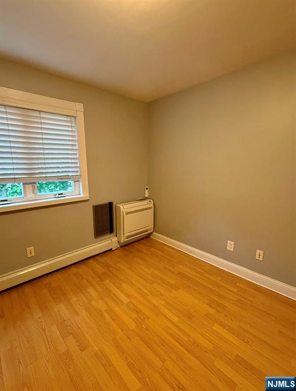 61 Hille Place, Unit 2 Ridgefield Park, NJ 07660 - Photo 18 of 19 a view of an empty room with a window