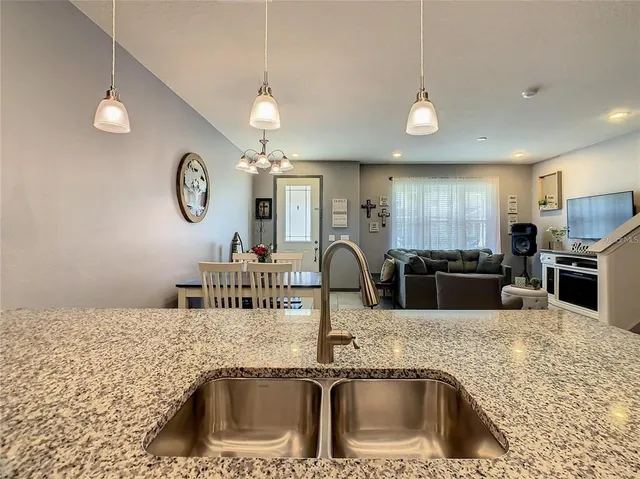 a bathroom with a sink toilet and a mirror
